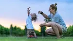 Feature image - Woman and child outside