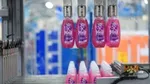 Persil Wonder Wash bottles in the manufacturing process.