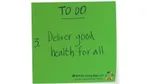 Green sticky note with Deliver good health for alll written on it