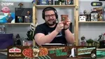 Gaming presenter holding up Magnum ice cream pint during a live stream